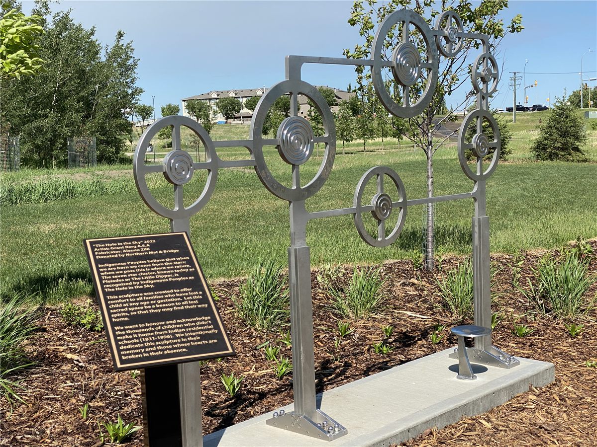Hole in the Sky - stainless steel memorial sculpture